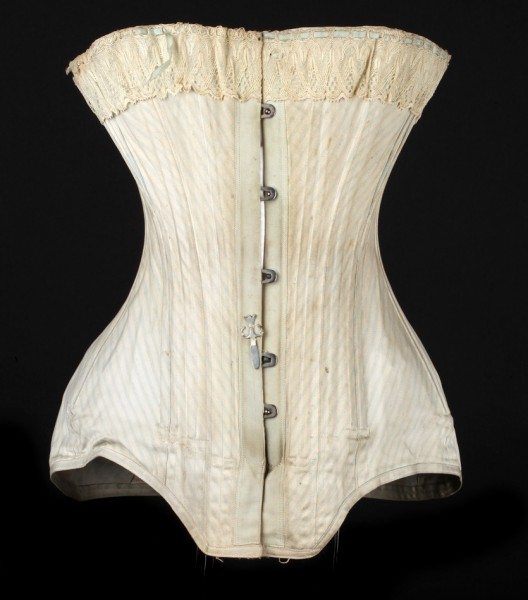 Corset baleiné en coutil de coton imprimé de rayures, fermé par des agrafes métalliques et resserré par un lacet, provenant de chez Lysens Soeurs, corseterie située rue Vinâve d'Ile à Liège, vers 1900.
